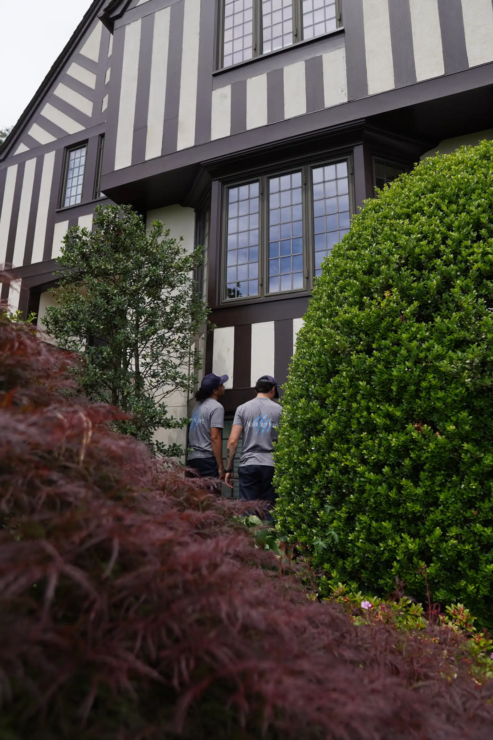 Tudor estate with divided-light windows cleaned pane by pane